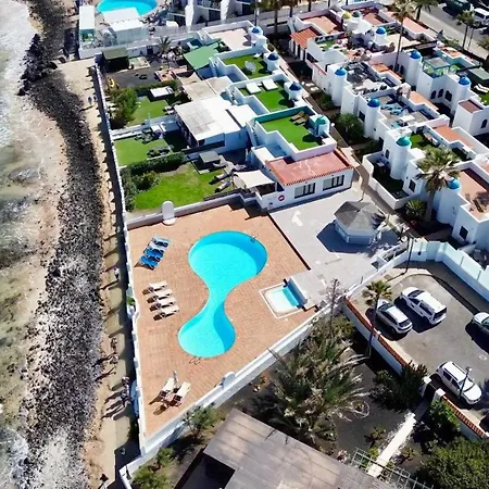 Geranio House, Beachfront, Pool, Ferienhaus *